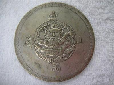 2016年上海一两银币在国外成交价格